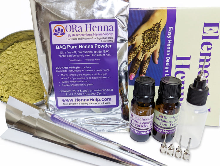 Essential henna kit for beginners, henna powder, essential oils, applicator bottle, and henna booklet