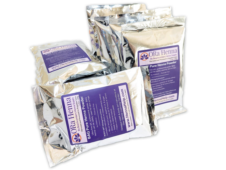 A kilo of ORa henna powder in 10 individual silver packages.