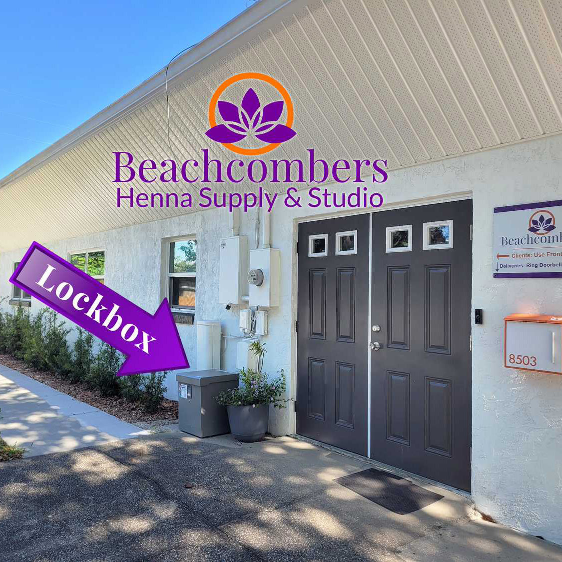 Picture of the side doors at Beachcombers Henna Studio with an arrow pointing at the lockbox