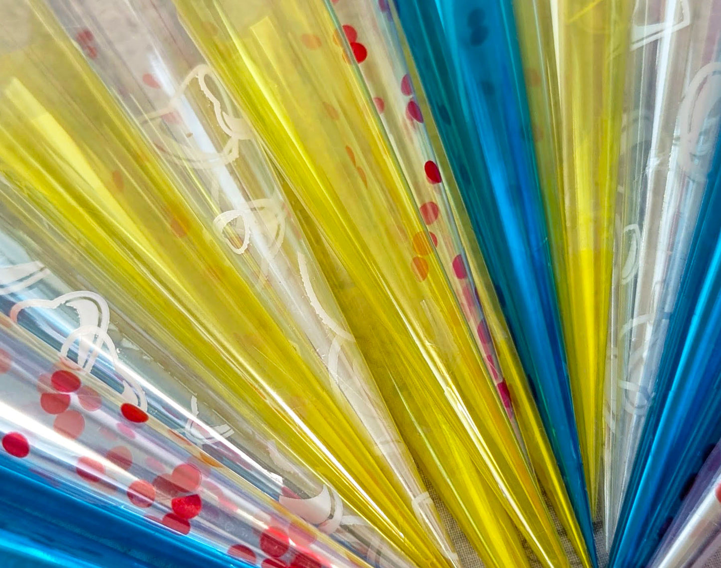 Close up of a variety of cello flats rolled into cones