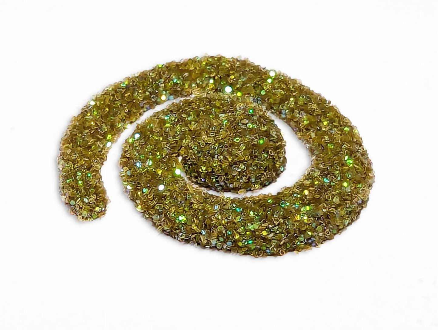 A spiral of wet henna covered with UV orange creamsicle body glitter