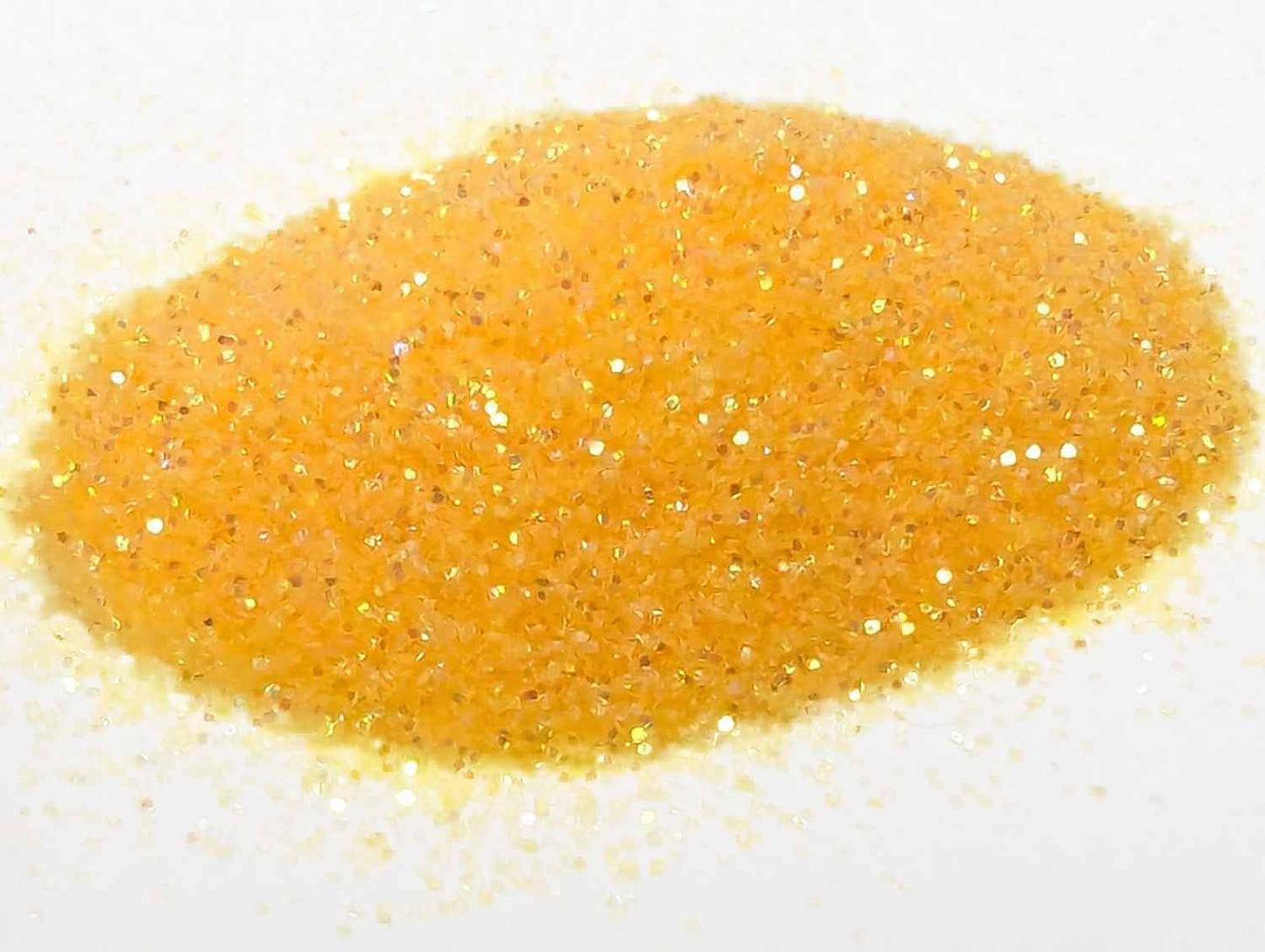 Small pile of UV orange creamsicle body glitter