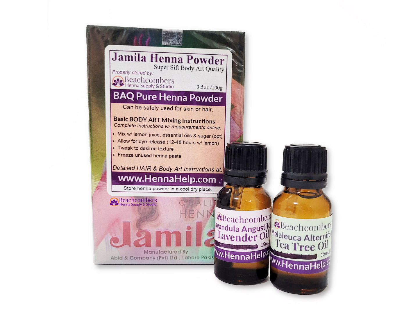 A box of Jamila henna with a bottle of lavender oil and a bottle of tea tree oil.