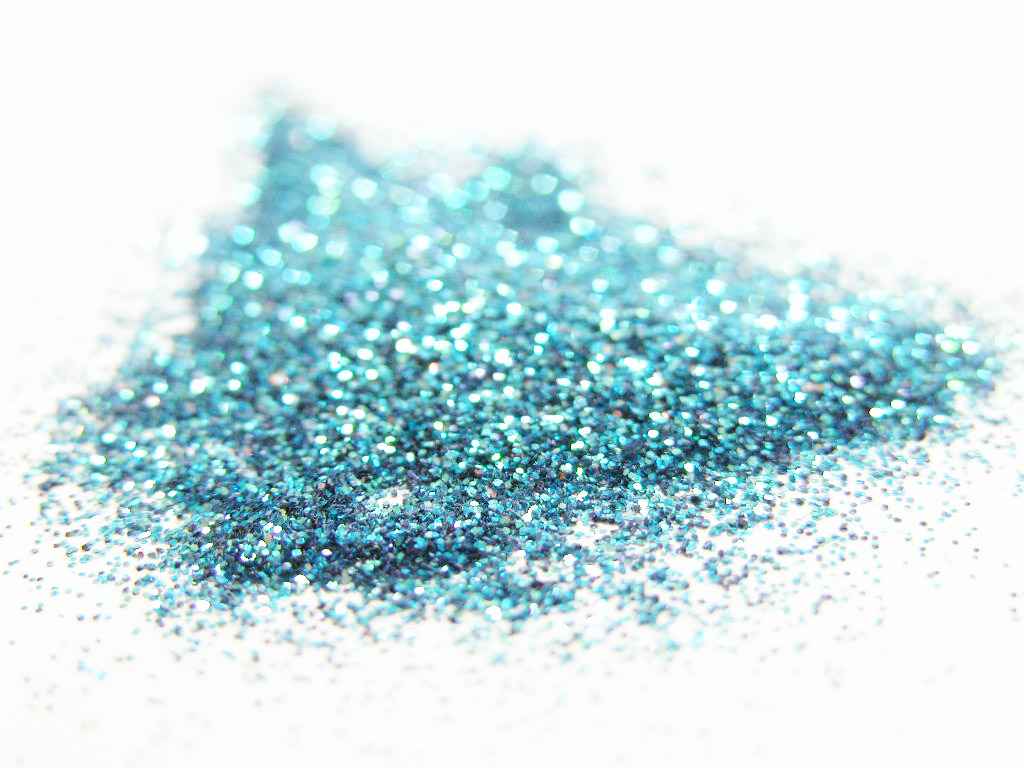 Light sky blue glitter, cosmetic grade - close up picture of loose glitter
