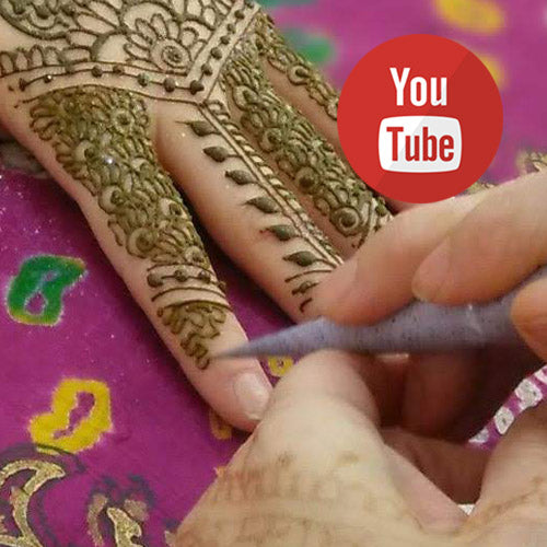 Picture of a henna cone doing detail work on a finger with the You Tube log in the top right corner.