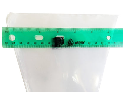 Top of carrot bag beside a green ruler, measures 6 inches