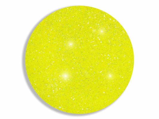 Close up of UV yellow neon lemonade body glitter cropped into a circle