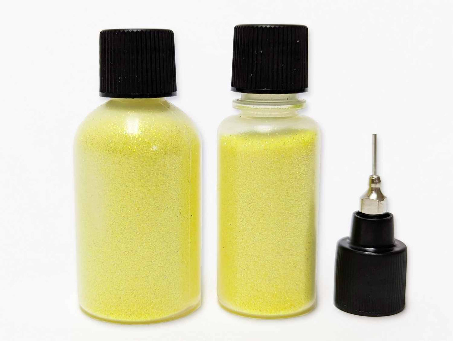 Two bottles of UV yellow neon lemonade body glitter (10g and 20g)