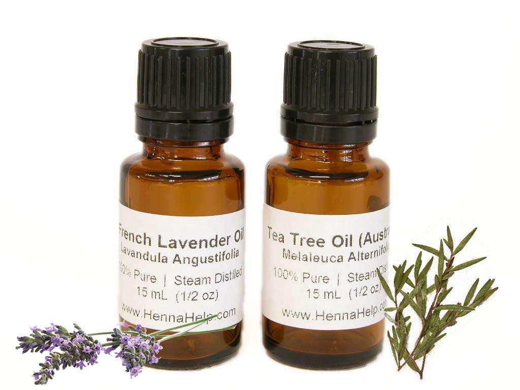 Two half ounce bottles of essential oil; tea tree and lavender