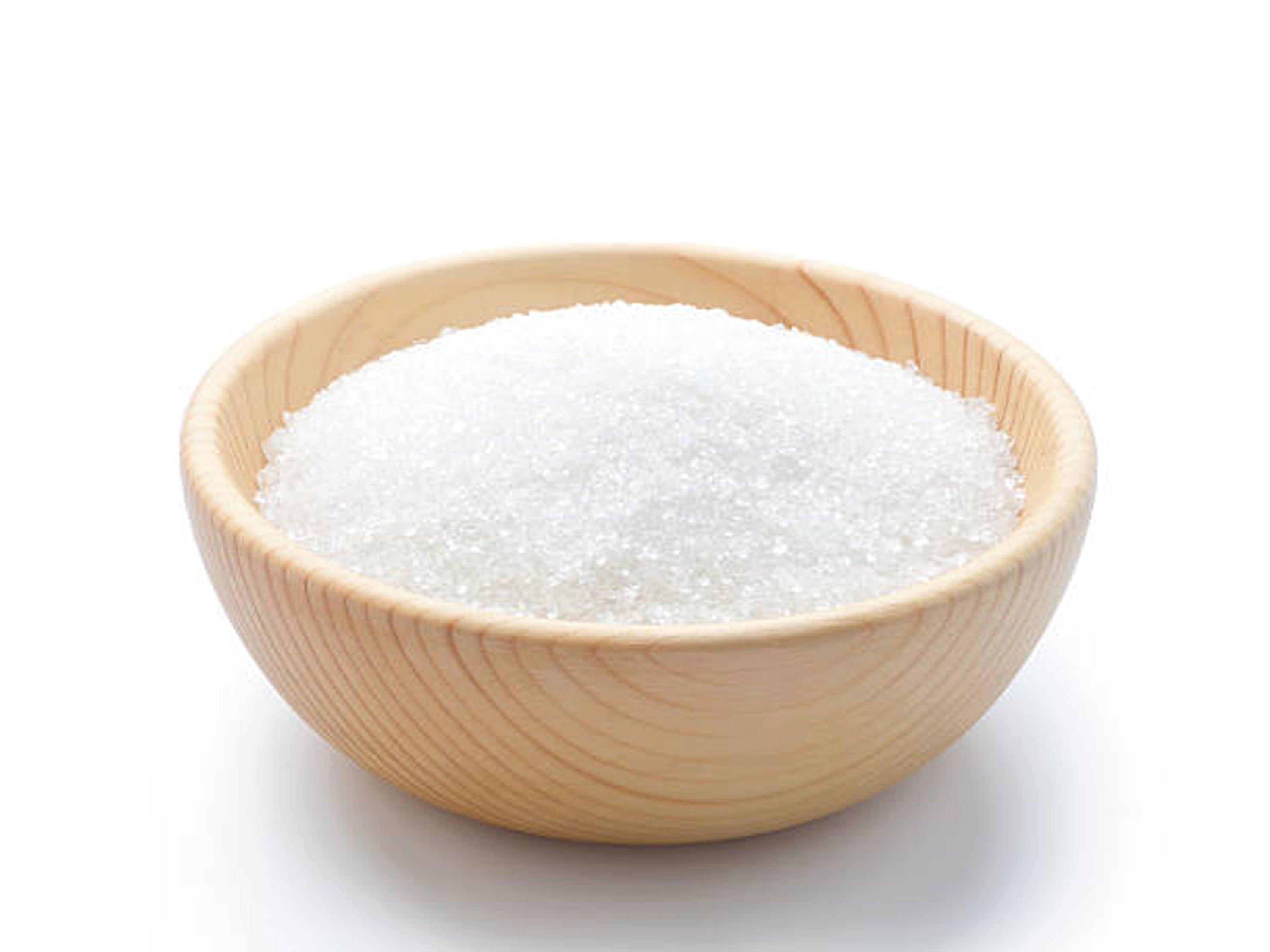 Wooden bowl of white table sugar.